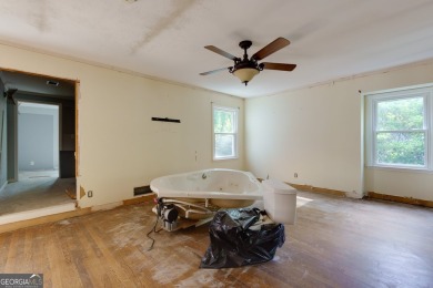 Beautiful spacious fixer upper in the heart of Buckhead.  This on Bobby Jones Golf Club in Georgia - for sale on GolfHomes.com, golf home, golf lot