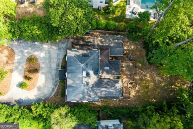 Beautiful spacious fixer upper in the heart of Buckhead.  This on Bobby Jones Golf Club in Georgia - for sale on GolfHomes.com, golf home, golf lot