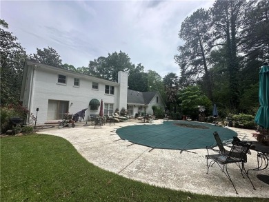 This spacious 5-bedroom, 3.5-bath brick home offers strong bones on Canongate At Flat Creek Club in Georgia - for sale on GolfHomes.com, golf home, golf lot