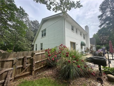 This spacious 5-bedroom, 3.5-bath brick home offers strong bones on Canongate At Flat Creek Club in Georgia - for sale on GolfHomes.com, golf home, golf lot