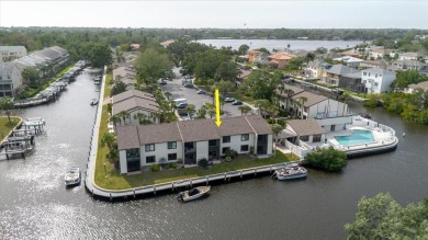 Moorings of Tarpon Springs, located across the street from on Tarpon Springs Golf Course in Florida - for sale on GolfHomes.com, golf home, golf lot