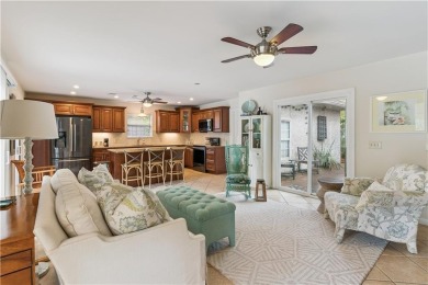 This charming and comfortable bungalow offers beautiful views of on Sea Island Golf Club in Georgia - for sale on GolfHomes.com, golf home, golf lot
