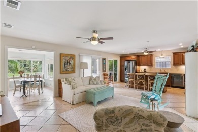 This charming and comfortable bungalow offers beautiful views of on Sea Island Golf Club in Georgia - for sale on GolfHomes.com, golf home, golf lot