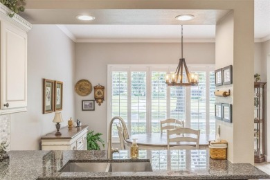 This St. James floor plan backing on the 10th tee of the Kings on Kings Ridge Golf Club in Florida - for sale on GolfHomes.com, golf home, golf lot