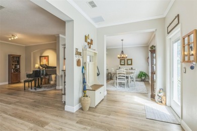 This St. James floor plan backing on the 10th tee of the Kings on Kings Ridge Golf Club in Florida - for sale on GolfHomes.com, golf home, golf lot