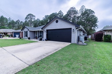 Welcome to this beautifully updated 4-bedroom, 2-bathroom home on The Club At Hidden Creek in Florida - for sale on GolfHomes.com, golf home, golf lot