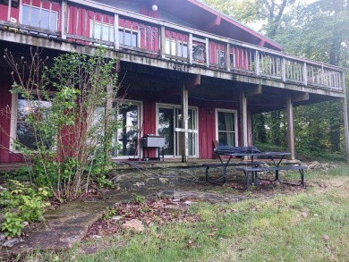 Spectacular view!! This 2/2 home on 2+ acres sits on a bluff on Cherokee Village North Course in Arkansas - for sale on GolfHomes.com, golf home, golf lot