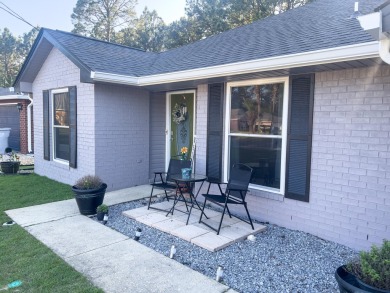 Welcome to this beautifully updated 4-bedroom, 2-bathroom home on The Club At Hidden Creek in Florida - for sale on GolfHomes.com, golf home, golf lot