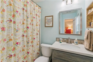 This charming and comfortable bungalow offers beautiful views of on Sea Island Golf Club in Georgia - for sale on GolfHomes.com, golf home, golf lot