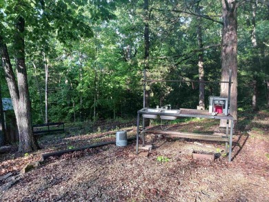 Spectacular view!! This 2/2 home on 2+ acres sits on a bluff on Cherokee Village North Course in Arkansas - for sale on GolfHomes.com, golf home, golf lot