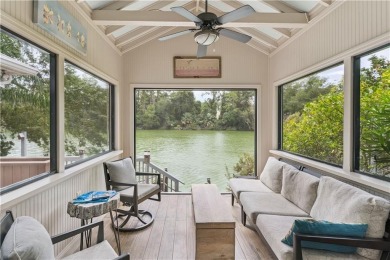 This charming and comfortable bungalow offers beautiful views of on Sea Island Golf Club in Georgia - for sale on GolfHomes.com, golf home, golf lot