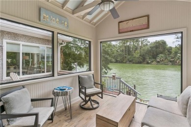 This charming and comfortable bungalow offers beautiful views of on Sea Island Golf Club in Georgia - for sale on GolfHomes.com, golf home, golf lot