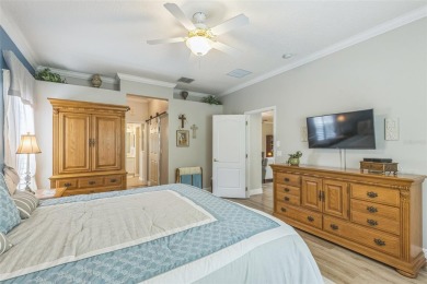 This St. James floor plan backing on the 10th tee of the Kings on Kings Ridge Golf Club in Florida - for sale on GolfHomes.com, golf home, golf lot