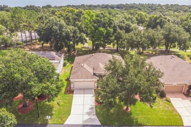 This St. James floor plan backing on the 10th tee of the Kings on Kings Ridge Golf Club in Florida - for sale on GolfHomes.com, golf home, golf lot
