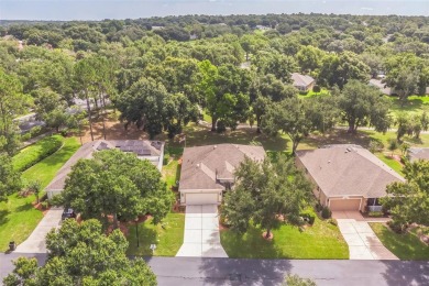 This St. James floor plan backing on the 10th tee of the Kings on Kings Ridge Golf Club in Florida - for sale on GolfHomes.com, golf home, golf lot