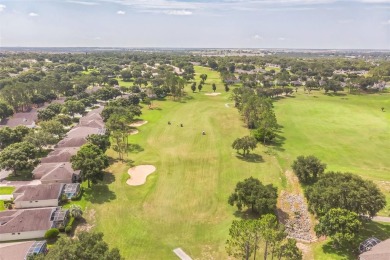 This St. James floor plan backing on the 10th tee of the Kings on Kings Ridge Golf Club in Florida - for sale on GolfHomes.com, golf home, golf lot