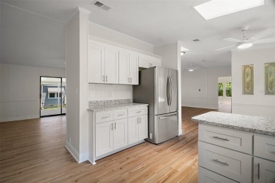One or more photo(s) has been virtually staged. Step into this on Zellwood Station Country Club in Florida - for sale on GolfHomes.com, golf home, golf lot