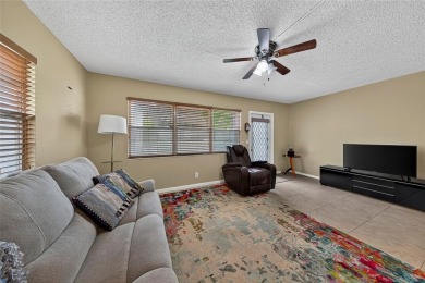 Welcome to this beautifully updated 1-bedroom, 1.5-bath on Hillsboro Pines Golf in Florida - for sale on GolfHomes.com, golf home, golf lot
