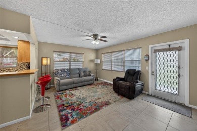 Welcome to this beautifully updated 1-bedroom, 1.5-bath on Hillsboro Pines Golf in Florida - for sale on GolfHomes.com, golf home, golf lot