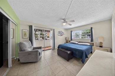 Welcome to this beautifully updated 1-bedroom, 1.5-bath on Hillsboro Pines Golf in Florida - for sale on GolfHomes.com, golf home, golf lot