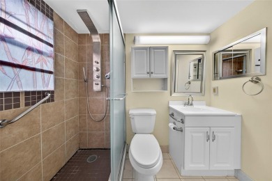 Welcome to this beautifully updated 1-bedroom, 1.5-bath on Hillsboro Pines Golf in Florida - for sale on GolfHomes.com, golf home, golf lot