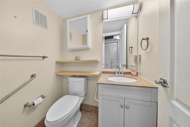 Welcome to this beautifully updated 1-bedroom, 1.5-bath on Hillsboro Pines Golf in Florida - for sale on GolfHomes.com, golf home, golf lot