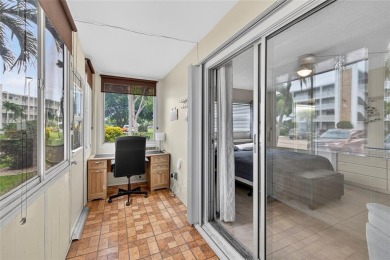 Welcome to this beautifully updated 1-bedroom, 1.5-bath on Hillsboro Pines Golf in Florida - for sale on GolfHomes.com, golf home, golf lot