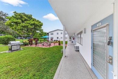 Welcome to this beautifully updated 1-bedroom, 1.5-bath on Hillsboro Pines Golf in Florida - for sale on GolfHomes.com, golf home, golf lot