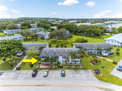 Welcome to this beautifully updated 1-bedroom, 1.5-bath on Hillsboro Pines Golf in Florida - for sale on GolfHomes.com, golf home, golf lot