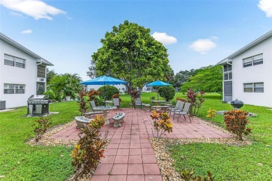Welcome to this beautifully updated 1-bedroom, 1.5-bath on Hillsboro Pines Golf in Florida - for sale on GolfHomes.com, golf home, golf lot