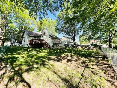 Welcome home to this charming raised ranch in Fairway Hills. As on Royal Meadows Golf Course in Missouri - for sale on GolfHomes.com, golf home, golf lot