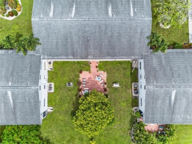 Welcome to this beautifully updated 1-bedroom, 1.5-bath on Hillsboro Pines Golf in Florida - for sale on GolfHomes.com, golf home, golf lot