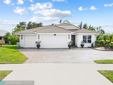 Boca Woods Country Club renovated home features full house on Boca Woods Country Club in Florida - for sale on GolfHomes.com, golf home, golf lot