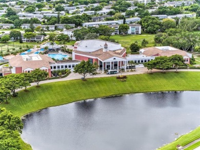 Welcome to this beautifully updated 1-bedroom, 1.5-bath on Hillsboro Pines Golf in Florida - for sale on GolfHomes.com, golf home, golf lot