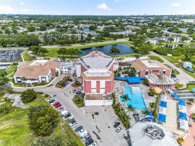 Welcome to this beautifully updated 1-bedroom, 1.5-bath on Hillsboro Pines Golf in Florida - for sale on GolfHomes.com, golf home, golf lot