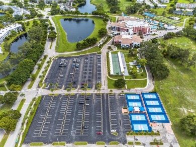 Welcome to this beautifully updated 1-bedroom, 1.5-bath on Hillsboro Pines Golf in Florida - for sale on GolfHomes.com, golf home, golf lot