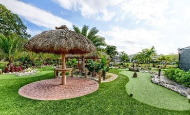 Welcome to this beautifully updated 1-bedroom, 1.5-bath on Hillsboro Pines Golf in Florida - for sale on GolfHomes.com, golf home, golf lot