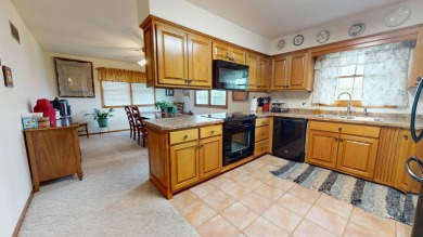 Welcome to this charming, custom-built multi-level home on Cedar Pointe Golf Course in Iowa - for sale on GolfHomes.com, golf home, golf lot