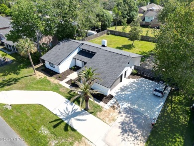Welcome to the highly sought-after Colony Club community! This on Holiday Golf Club in Florida - for sale on GolfHomes.com, golf home, golf lot