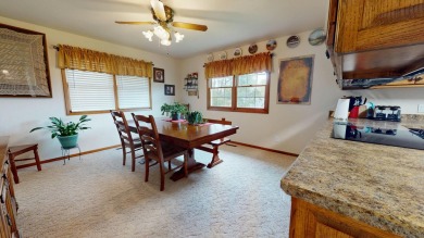 Welcome to this charming, custom-built multi-level home on Cedar Pointe Golf Course in Iowa - for sale on GolfHomes.com, golf home, golf lot