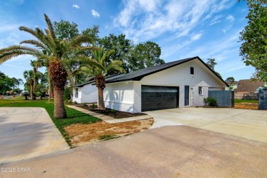 Welcome to the highly sought-after Colony Club community! This on Holiday Golf Club in Florida - for sale on GolfHomes.com, golf home, golf lot