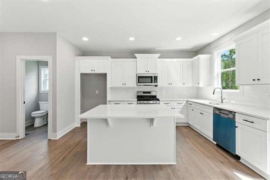 Welcome Home to 29 Creekview Drive! This stunning Alexander on The Plantation Golf Club in Georgia - for sale on GolfHomes.com, golf home, golf lot