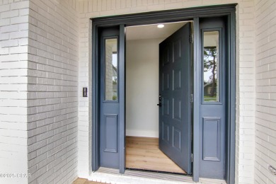 Welcome to the highly sought-after Colony Club community! This on Holiday Golf Club in Florida - for sale on GolfHomes.com, golf home, golf lot