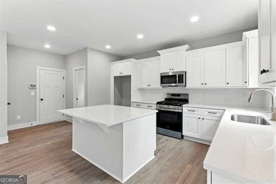 Welcome Home to 29 Creekview Drive! This stunning Alexander on The Plantation Golf Club in Georgia - for sale on GolfHomes.com, golf home, golf lot