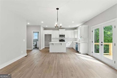 Welcome Home to 29 Creekview Drive! This stunning Alexander on The Plantation Golf Club in Georgia - for sale on GolfHomes.com, golf home, golf lot