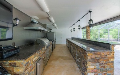 Welcome to your own private estate -- a true masterpiece of on Quail Heights Golf and Country Club in Florida - for sale on GolfHomes.com, golf home, golf lot