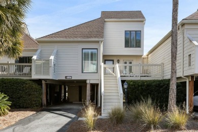 Charming Spinnaker Beach House overlooking the stunning views of on The Seabrook Island Club in South Carolina - for sale on GolfHomes.com, golf home, golf lot