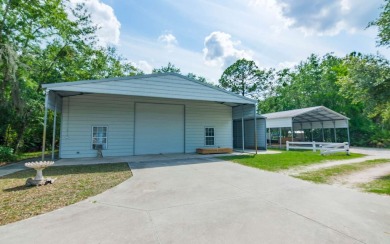 Welcome to your own private estate -- a true masterpiece of on Quail Heights Golf and Country Club in Florida - for sale on GolfHomes.com, golf home, golf lot