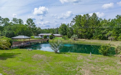 Welcome to your own private estate -- a true masterpiece of on Quail Heights Golf and Country Club in Florida - for sale on GolfHomes.com, golf home, golf lot