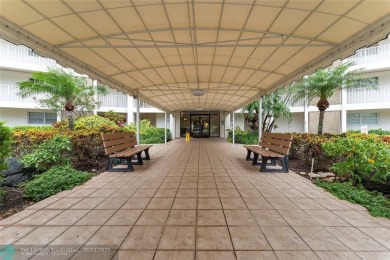 Welcome! This spacious 2/2 in Palm Aire features renovated and on Palm-Aire Country Club and Resort - Palms in Florida - for sale on GolfHomes.com, golf home, golf lot